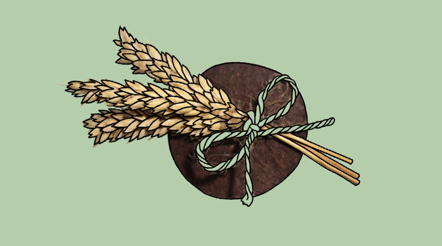 A memorial badge with ears of grain